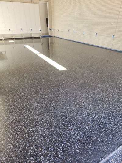 Matte honed concrete surface in a residential interior with soft, non-reflective finish